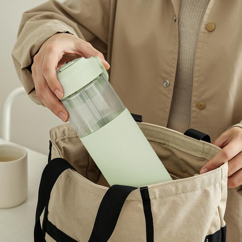 Sandjest 20oz Glass Water Bottle – Reusable, Leakproof, Stylish with Straw Lid & Silicone Sleeve.